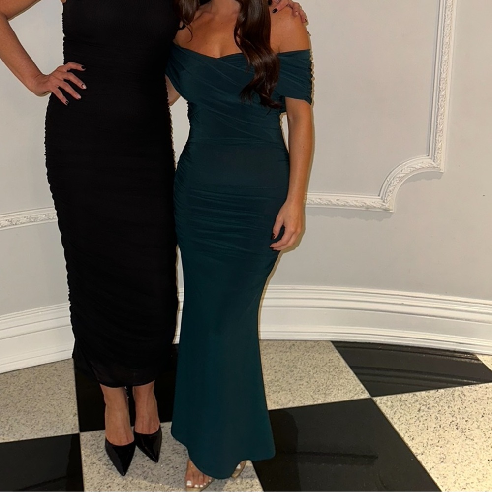 Emerald green maxi dress with off the shoulder detail and ruched sides